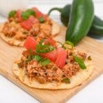 Keto Chicken Tostadas with green onions and tomatoes &ndash; a low-carb delight!