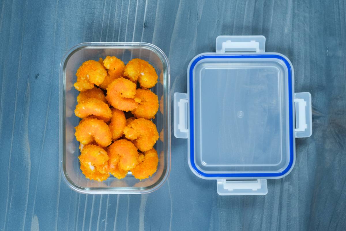Camarones Empanizados in an airtight container.