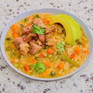 Dominican asopao de longaniza served hot in a bowl