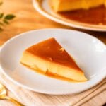 Creamy Venezuelan quesillo slice with golden caramel sauce