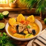Bowl of Dominican mahi-mahi soup with vegetables and plantain