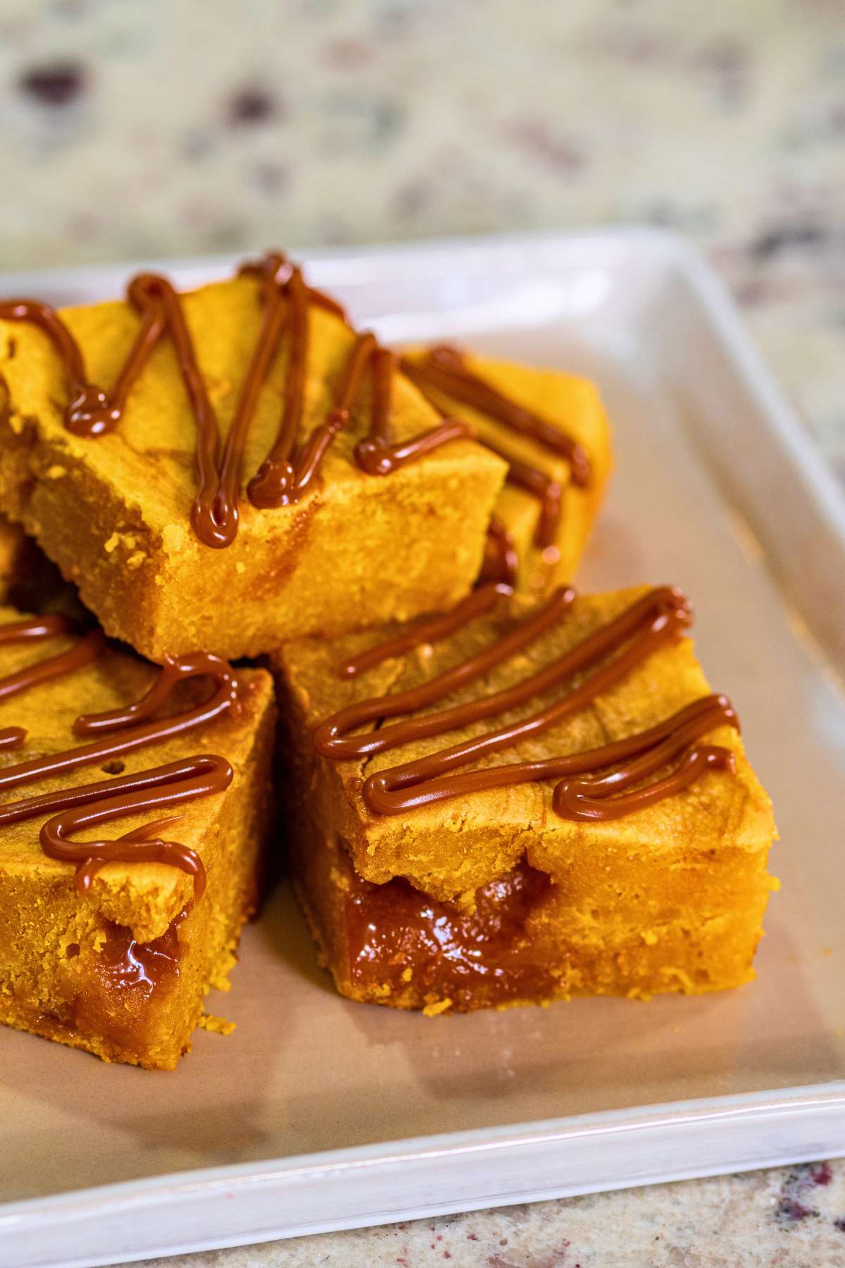 Chewy pumpkin blondies with golden edges