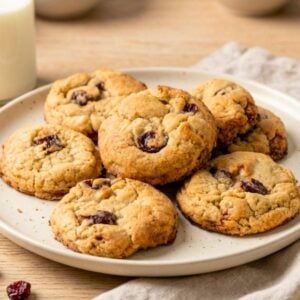 New York-style guava and white chocolate cookies on a white ceramic plate