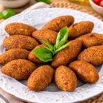 Homemade Dominican quipes served golden and crispy