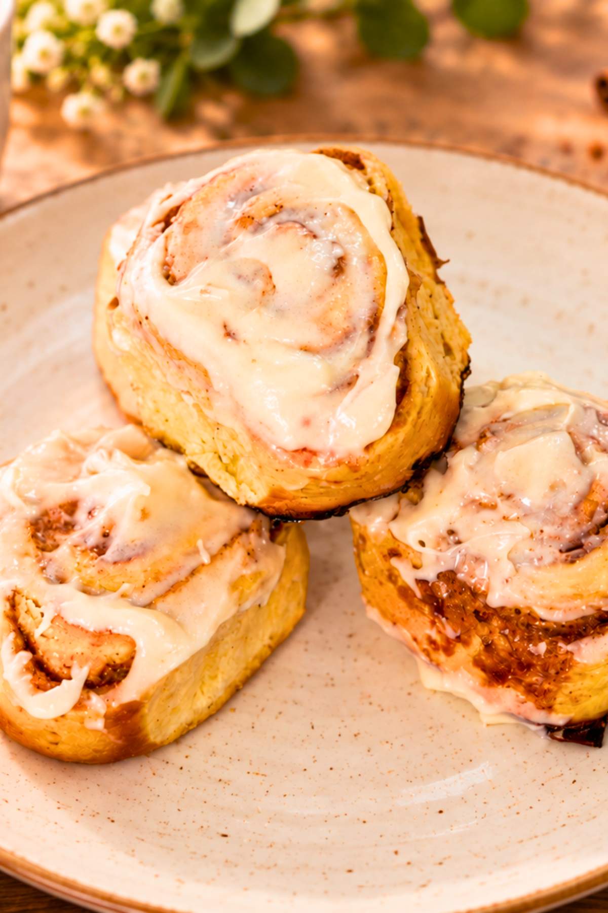 Freshly baked homemade cinnamon rolls with cream