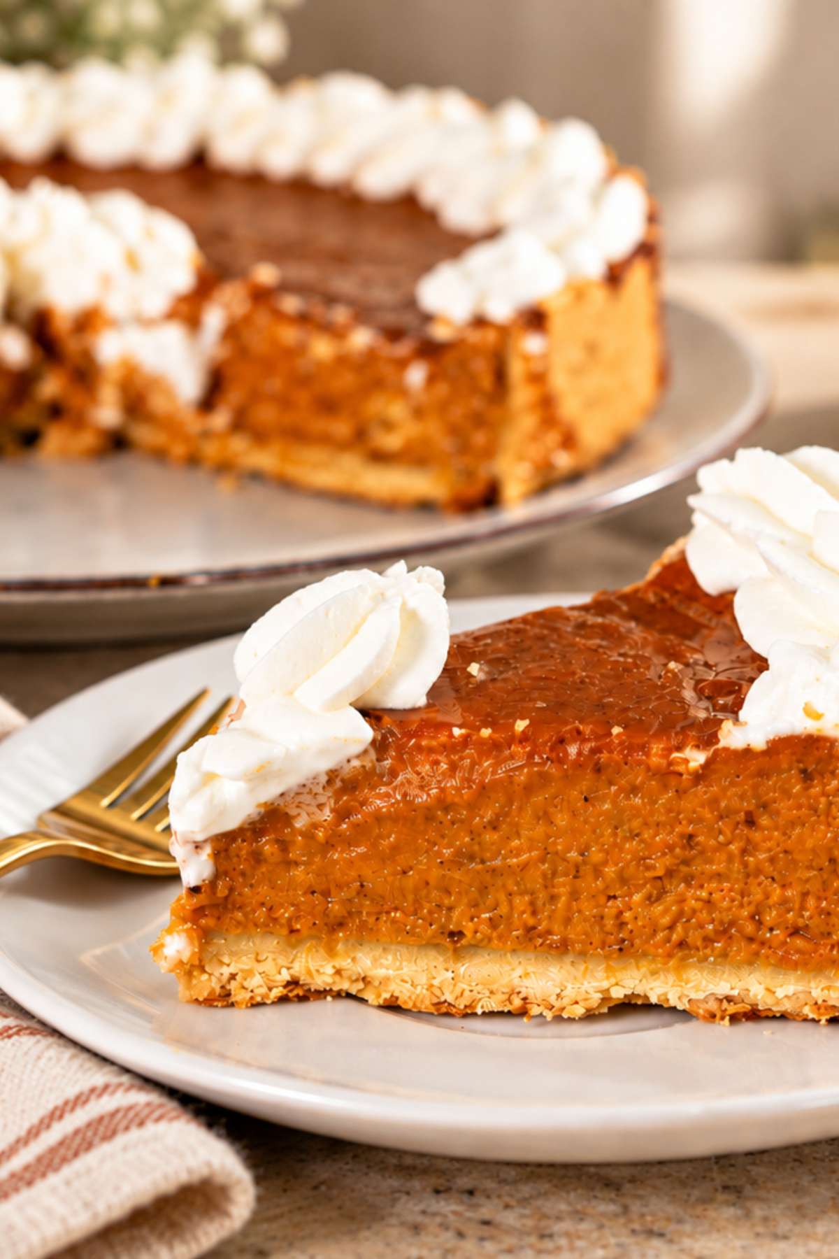 Pumpkin pie with a golden buttery crust and smooth filling