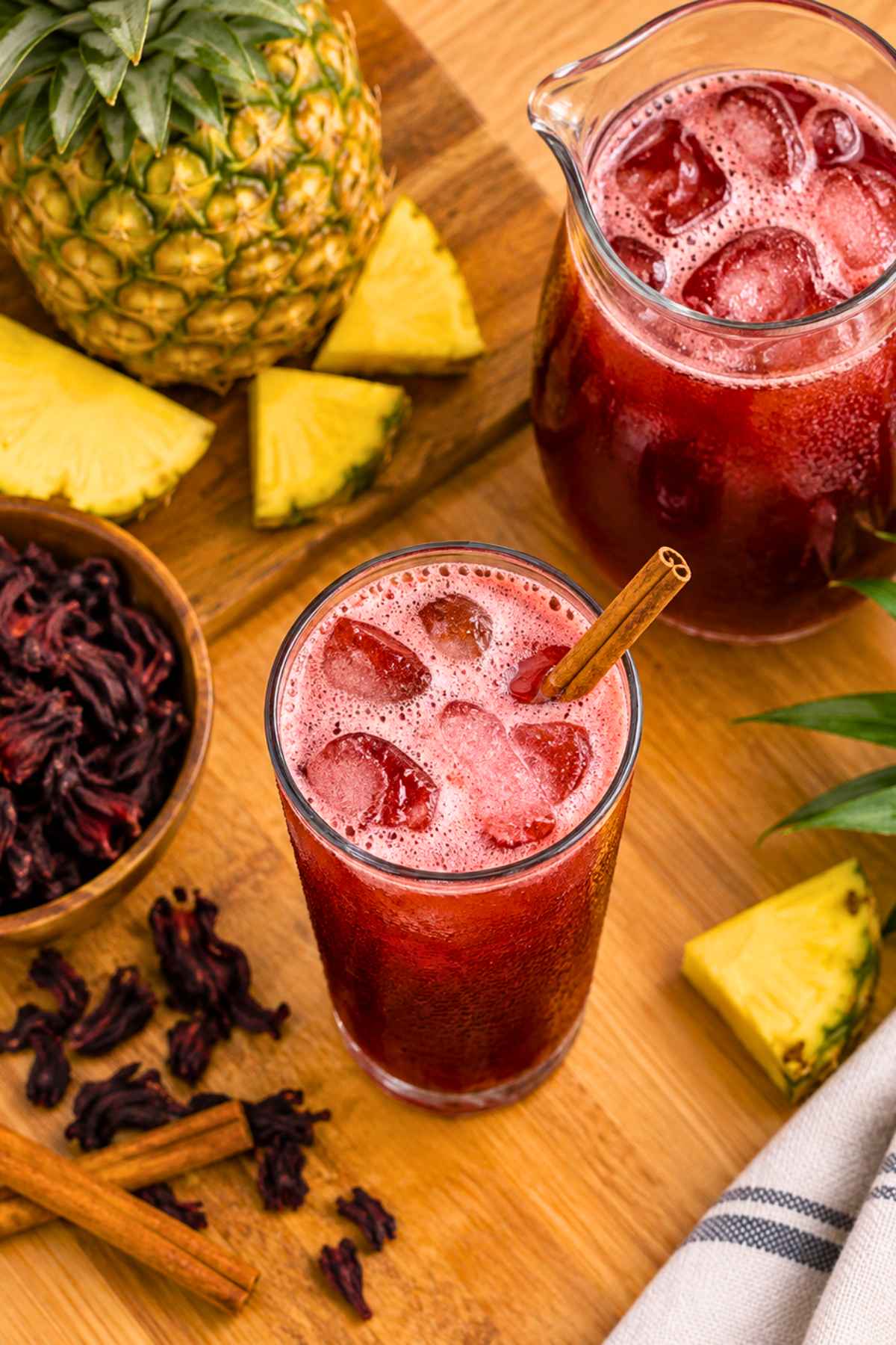 Homemade pineapple juice with hibiscus flowers
